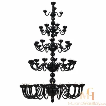Striking black Murano glass chandelier in a grand Venetian style, featuring five tiers of curved arms with lights, hand-blown in Italy for a dramatic and elegant statement piece.