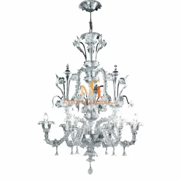 Intricately designed Venetian glass chandelier with multiple curved arms, floral detailing, and clear glass light fixtures.