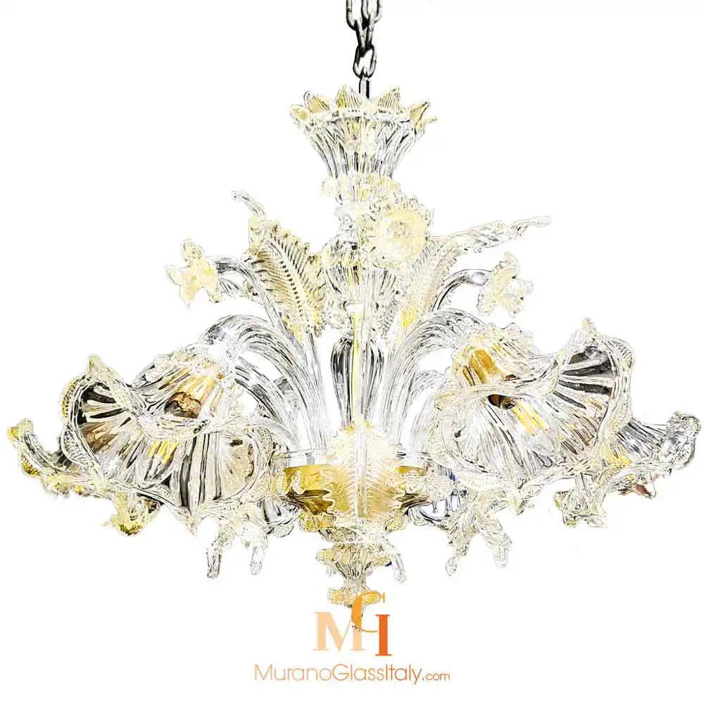 verde-gold-2 Murano glass chandelier with clear and gold hand-blown glass, featuring fluted floral arms, ornate leaves, and intricate Venetian detailing.