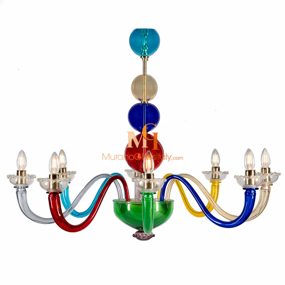Ambra - Colored Glass Chandelier - Front View Colored glass chandelier with vibrant curved arms in red, blue, yellow, and teal, featuring bulbs and a stacked multicolor glass centerpiece in Murano-style design.