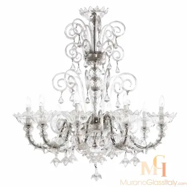 Elegant luxury Venetian chandelier made of clear Murano glass with swirling arms, teardrop pendants, and twelve candle-style bulbs.