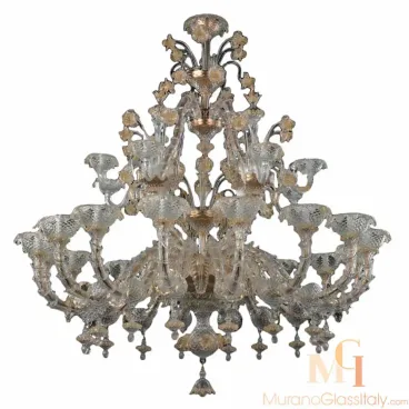Elegant Venetian chandelier handcrafted from clear-amber Murano glass, featuring intricate floral accents, layered curved arms, and classic baroque styling for a luxurious statement piece.
