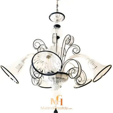 Modern blown glass chandelier with clear fluted shades, black trim, and decorative swirling glass arms.