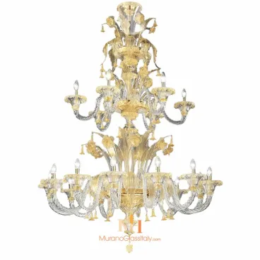 Gold and crystal chandelier with intricate glass arms, floral accents, and multiple tiers of candle-style bulbs in a grand cascading design.