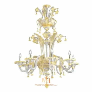 Gold and crystal chandelier with leaf-like glass arms, hanging floral details, and candle-style bulbs in an elegant two-tier arrangement.