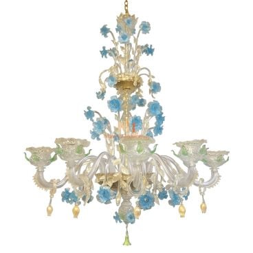Hand-blown Murano chandelier from Venice with clear glass arms, light gold accents, and blue flowers with green leaves.